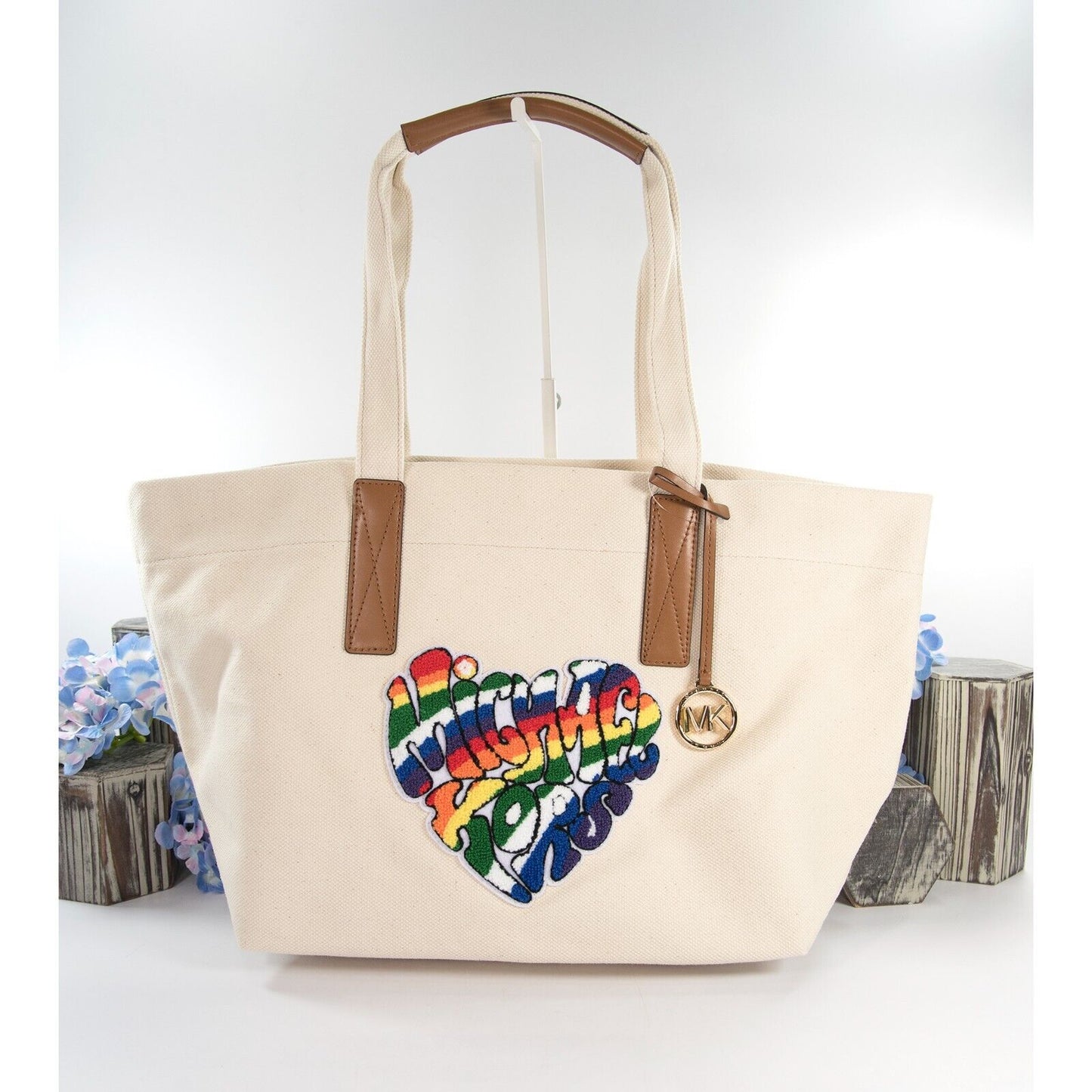 Buy the Michael Kors Tan Canvas Tote Bag